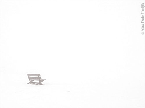 Empty Bench in the Snow