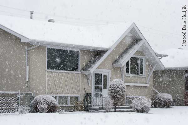 A House in a Spring Snow Storm