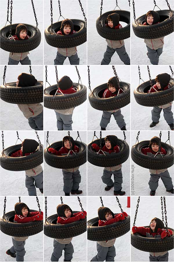 little boy on a tire swing